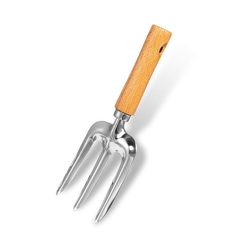 Wooden handle stainless steel gardening watering jug and garden gardening fork